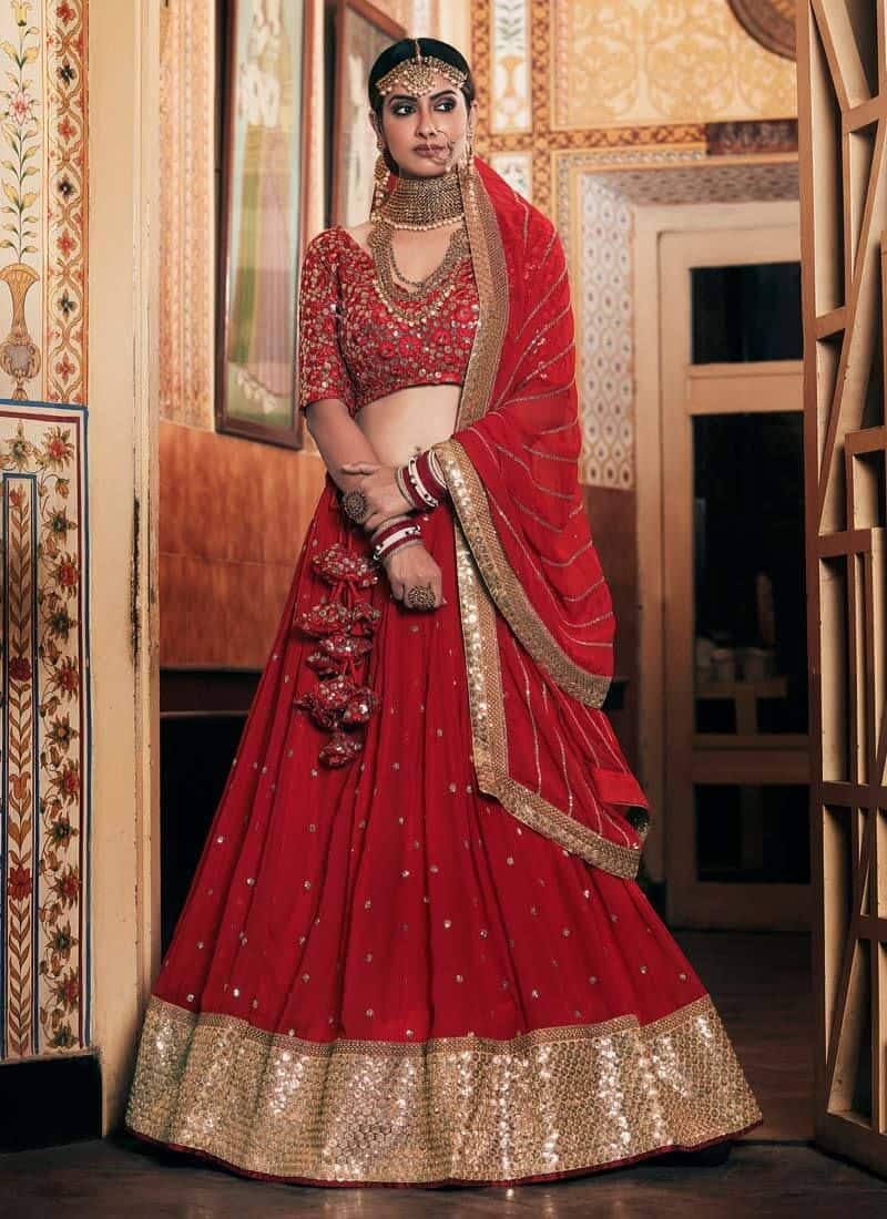Red And Golden Embroidered Party Wear Lehenga Suit