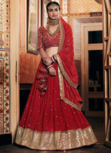 Girl Makes Herself Look Thin By Wearing A Monotone Lehenga Choli That Is Attractive And Minimally Embroidered.